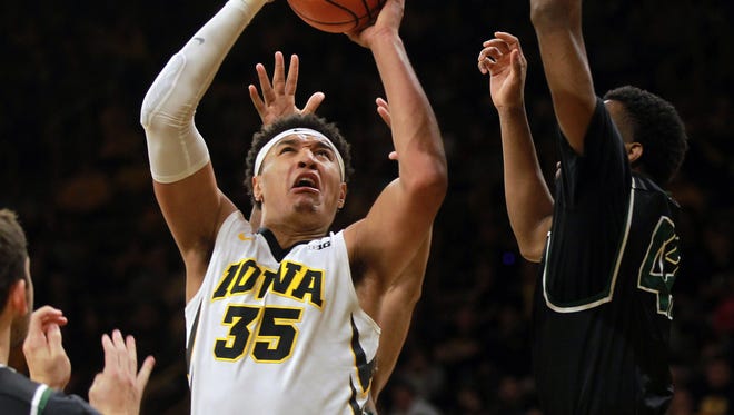 Iowa's Cordell Pemsl goes up for a contested shot during the Hawkeyes' game against Chicago State at Carver-Hawkeye Arena on Friday, Nov. 10, 2017.