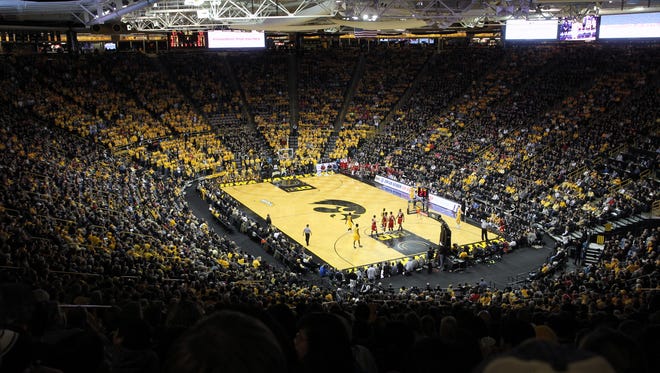 Iowa fans cheer on the Hawkeyes during their game against Wisconsin at Carver-Hawkeye Arena on Wednesday, Feb. 24, 2016.