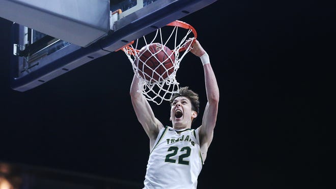 Iowa City West's Patrick McCaffery dunks the ball during the IHSAA state basketball Class 4A quarterfinal game between Muscatine and Iowa City West on Tuesday, March 6, 2018, in Wells Fargo Arena. Iowa City West won the game, 62-50, to advance to the tournament semifinals.
