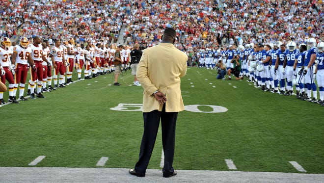 From 2008: Hall of Fame inductee Andre Tippett is introduced before the 2008 Hall of Fame game between the Indianapolis Colts and Washington Redskins at Fawcett Stadium.