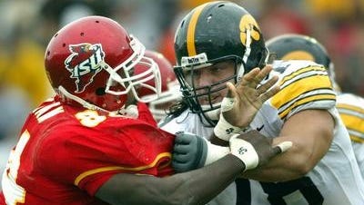 Iowa offensive lineman Robert Gallery was named to Playboy magazine's preseason all-America football team prior to the 2003 season. He is pictured blocking Iowa State's Jason Berryman in this 2003 photo.