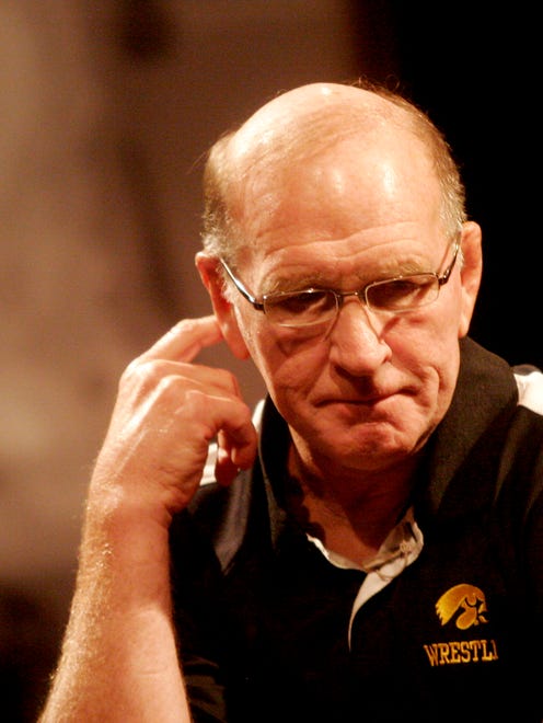 Hawkeye icon Dan Gable takes a moment while reflecting about the death of his older sister, Diane during "This Is Your Life, Dan Gable" at the Coralville Marriott Hotel and Convention Center kicking off FryFest 2011 on Sept. 2 in Coralville.