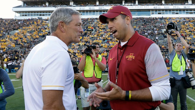 Kirk Ferentz, left, and Matt Campbell will have to wait until perhaps 2021 for their fifth coaching matchup. Ferentz and the Hawkeyes have won all four meetings against the Campbell-coached Cyclones.