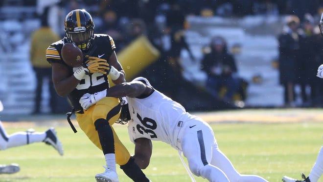 Adrian Falconer (2015-2017) secures a catch against Purdue on Nov. 21, 2015 at Kinnick Stadium.