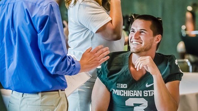 MSU punter Mike Sadler landed at No. 18 on Seventeen magazine?s hottest college football players list. 
 Kevin W. Fowler/For the LSJ
MSU punter Mike Sadler laughs at a media question during MSU Football Media Day Tuesday January 3, 2013 in Delta Township.  KEVIN W. FOWLER PHOTO