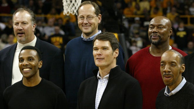 Members of Iowa's 1980 Final Four team were honored at Carver-Hawkeye Arena in 2005. In front, from left, Ronnie Lester, Jon Darsee and Kenny Arnold and in back, from left, Mike Heller, Steve Waite and Vince Brookins.