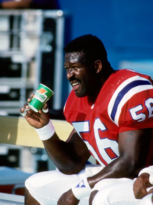 From 1991: New England Patriots linebacker Andre Tippett (56) on the bench against the New York Giants at Foxboro Stadium.