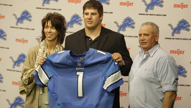 Detroit Lions first round draft pick offensive tackle Riley Reiff, center, poses with his mother Joellen Reiff, , left, and father Tommie Reiff, before his press conference in  Allen Park on April 27, 2012.