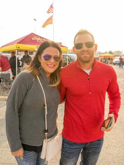 Sara Deustch, 28, and Aaron Deustch, 28, both of Ollie, having a great day tailgating at the 2017 Iowa Vs. Iowa State Game.