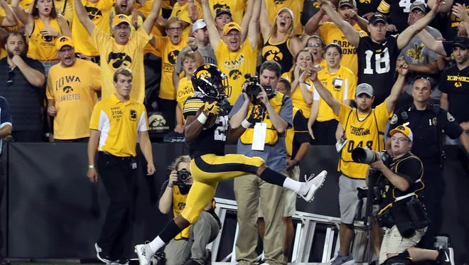 OK, so Akrum Wadley high-stepped on his go-ahead, fourth-quarter touchdown against Penn State. "You (saw) me give the ball right to the ref, though," he said this week. Wadley is Iowa's leader in rushing and receiving yards.