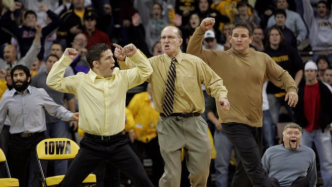 On Dec. 21, 2006, Iowa assistant Dan Gable and others celebrate a moment.