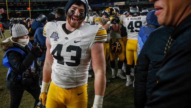 Iowa senior linebacker Josey Jewell is all smiles after the Hawkeyes won, 27-20, over Boston College during the 2017 Pinstripe Bowl at Yankee Stadium in Bronx, New York on Wednesday, Dec. 27, 2017.