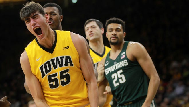 Iowa's Luka Garza celebrates a basket and foul during the Hawkeyes' game against Michigan State at Carver-Hawkeye Arena on Tuesday, Feb. 6, 2018.
