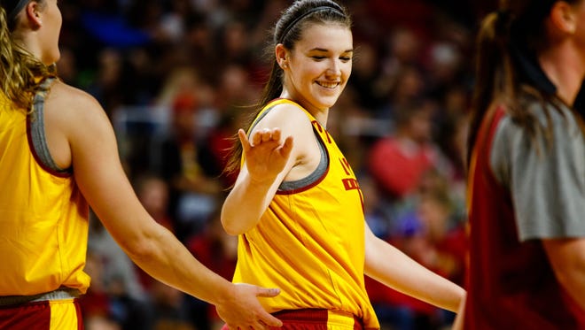 Iowa State's Bridget Carleton high fives a teammate during Hilton Madness at the Hilton Coliseum on Friday, Oct. 13, 2017, in Ames.