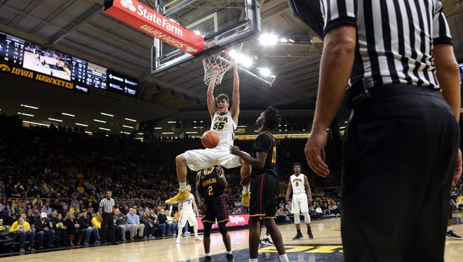 Iowa's Luka Garza dunks the ball during the Hawkeyes' game against Grambling State at Carver-Hawkeye Arena on Thursday, Nov. 16, 2017.