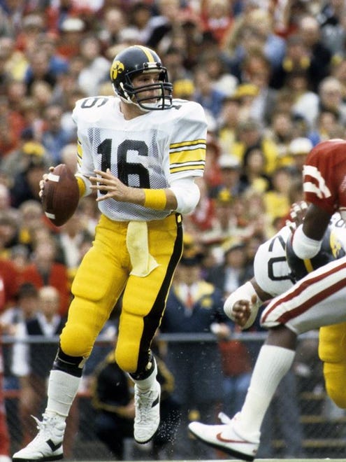 Chuck Long, shown in 1985, threw for 306 yards and three touchdowns as Iowa beat Tennessee in the 1982 Peach Bowl.
