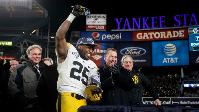 Iowa senior running back Akrum Wadley was named player of the game in Iowa's 27-20 win over Boston College during the 2017 Pinstripe Bowl at Yankee Stadium in Bronx, New York on Wednesday, Dec. 27, 2017.