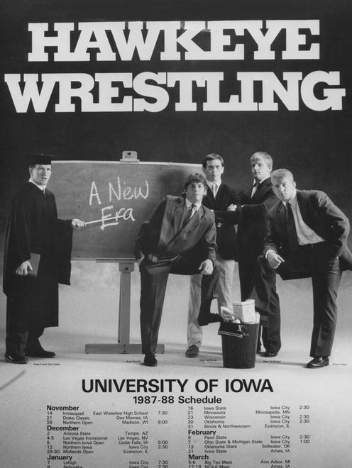 Iowa's 1987-88 wrestling poster depicts Dan Gable teaching "A New Era."