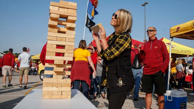 Lindsay Jess of Davenport celebrates her birthday by tailgating prior to the CyHawk Series game between Iowa and Iowa State on Saturday, Sept. 9, 2017, at Jack Trice Stadium in Ames, Iowa.