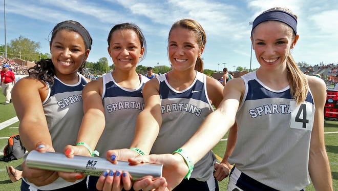 Pleasant Valley set a new record in the Class 4-A girls' distance medley relay with time of 3:57.59 at the state track meet held at Drake Stadium in Des Moines on May 23. From left: Alyssa Simon, Jordan Simon, Addie Swanson and Kaley Ciluffo.