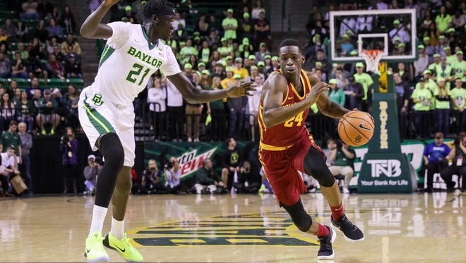 Iowa State guard Terrence Lewis drives the lane against Baylor's Nuni Omot during their game Saturday, Feb 3, 2018, in Waco, Texas.