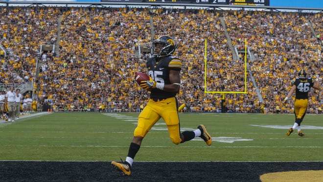 Iowa running back Akrum Wadley runs into the end zone for a touchdown against Miami (Ohio) on Saturday, Sept. 3, 2016, at Kinnick Stadium in Iowa City.