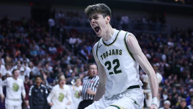 Iowa City West's Patrick McCaffery celebrates after dunking the ball during the IHSAA state basketball Class 4A quarterfinal game between Muscatine and Iowa City West on Tuesday, March 6, 2018, in Wells Fargo Arena. Iowa City West won the game, 62-50, to advance to the semifinals.