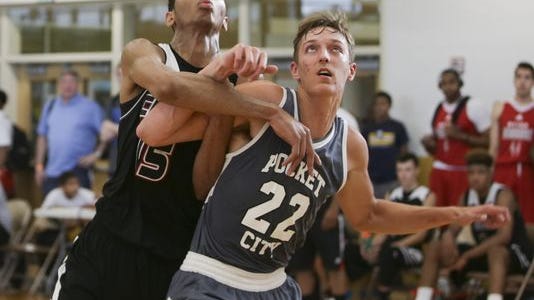 Castle's Jack Nunge (22), shown playing for the Pocket City AAU club, will play college basketball at the University of Iowa beginning in 2017-18.