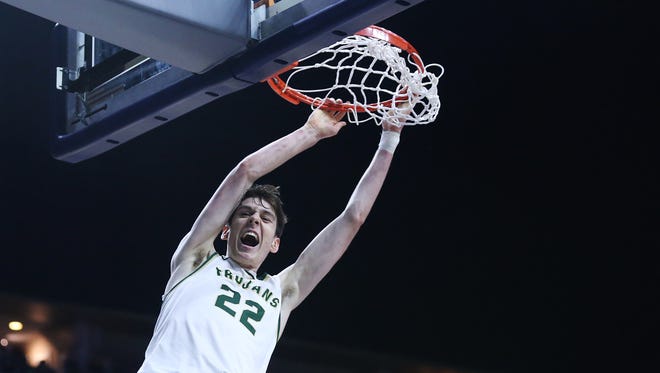 Iowa City West's Patrick McCaffery dunks the ball during the IHSAA state basketball Class 4A quarterfinal game between Muscatine and Iowa City West on Tuesday, March 6, 2018, in Wells Fargo Arena. Iowa City West won the game, 62-50, to advance to the semifinals.