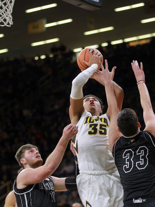 Iowa's Cordell Pemsl takes a shot during the Hawkeyes' game against Northern Illinois at Carver-Hawkeye Arena on Friday, Dec. 29, 2017.