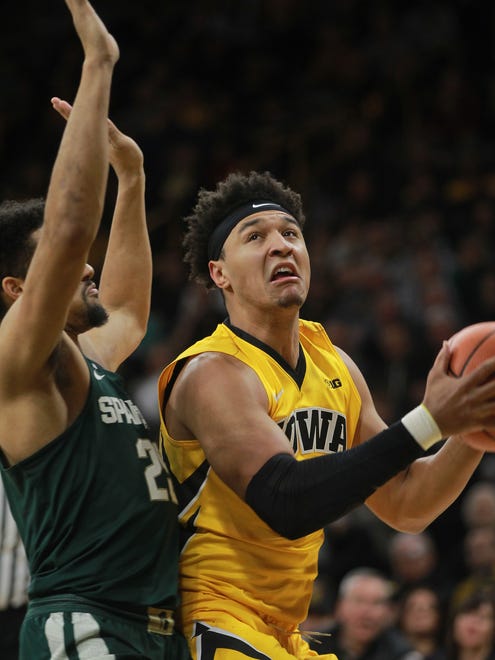 Iowa's Cordell Pemsl drives to the hoop during the Hawkeyes' game against Michigan State at Carver-Hawkeye Arena on Tuesday, Feb. 6, 2018.