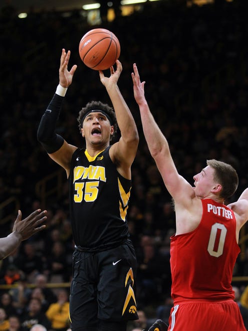 Iowa's Cordell Pemsl takes a shot during the Hawkeyes' game against Ohio State at Carver-Hawkeye Arena on Thursday, Jan. 4, 2018.