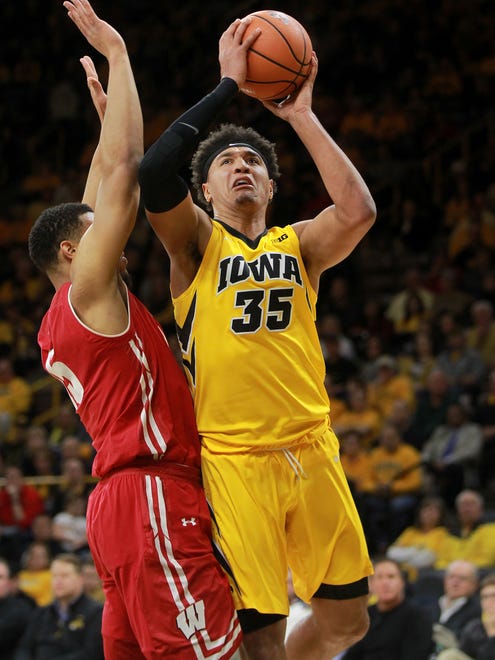 Iowa's Cordell Pemsl puts up a shot during the Hawkeyes' game against Wisconsin at Carver-Hawkeye Arena on Tuesday, Jan. 23, 2018.