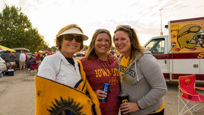 Linda Mathers, 63, of Ankeny, Sarah Clark, 35, of Cedar Rapids, and Lindsay Trueblood, 35, of Bondourant, having a fun time at the 2017 Iowa Vs. Iowa State Game.