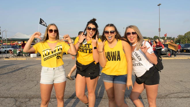 Emily Jensen, 20, of Omaha, Ashley Turcotte, 20, of Anchorage, Maddi Brummond, 21, of Dike, and Sadie Eden, 22, of New Haven, having a fun time at the 2017 Iowa Vs. Iowa State Game.