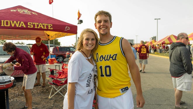 Maddy Tolk, 19, and Donnie Seivert, 19, both of Sheldon, having a ton of fun at the 2017 Iowa Vs. Iowa State Game.