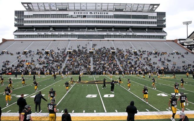 Fans find their seats for the Iowa Hawkeyes football open spring practice Saturday, April 20, 2024 at Kinnick Stadium in Iowa City, Iowa.