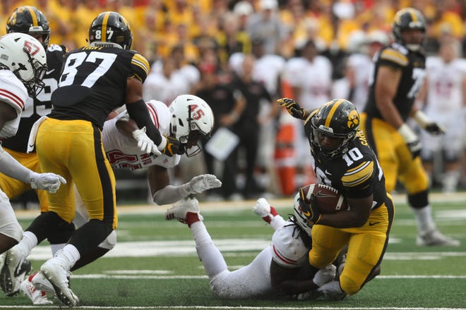 Iowa's Mekhi Sargent runs down field during the Hawkeyes' game against Northern Illinois at Kinnick Stadium on Satuday, Sept. 1, 2018.