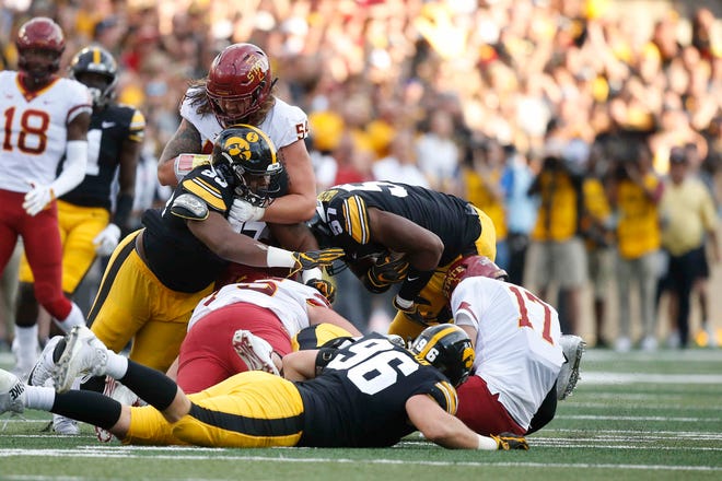 Iowa State quarterback Kyle Kempt crumples after being sacked in the fourth quarter against Iowa on Saturday, Sept. 9, 2018, at Kinnick Stadium in Iowa City.
