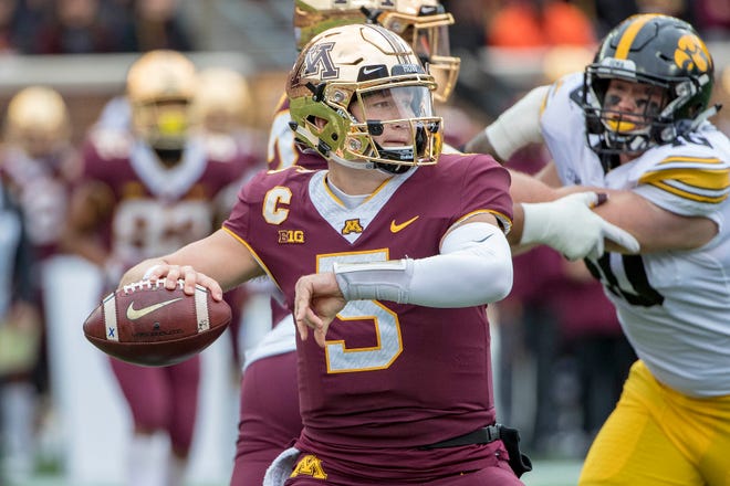 Oct 6, 2018; Minneapolis, MN, USA; Minnesota Golden Gophers quarterback Zack Annexstad (5) drops back to pass against the Iowa Hawkeyes in the first quarter at TCF Bank Stadium. Mandatory Credit: Jesse Johnson-USA TODAY Sports