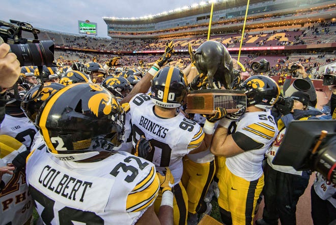 Oct 6, 2018; Minneapolis, MN, USA; A general view of the Iowa Hawkeyes lifting up the Floyd of Rosedale trophy at TCF Bank Stadium. Mandatory Credit: Jesse Johnson-USA TODAY Sports