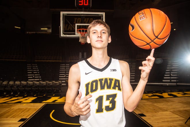 Iowa guard Austin Ash poses for a photo during Hawkeye media day at Carver Hawkeye ArenaMonday, Oct. 8, 2018.