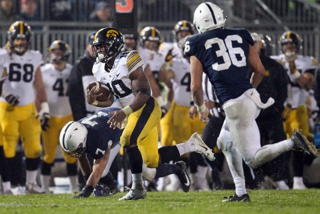 Oct 27, 2018; University Park, PA, USA; Iowa Hawkeyes running back Mekhi Sargent (10) runs with the ball during the fourth quarter against the Penn State Nittany Lions at Beaver Stadium. Penn State defeated Iowa 30-24. Mandatory Credit: Matthew O'Haren-USA TODAY Sports