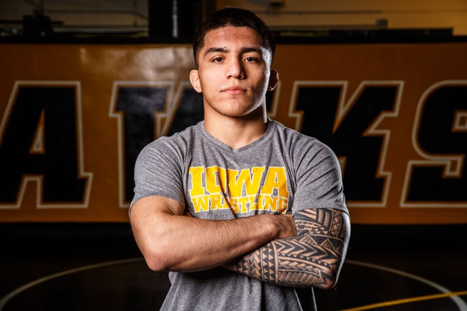 Pat Lugo stands for a portrait during Iowa wrestling media day Monday, Nov. 5, 2018.