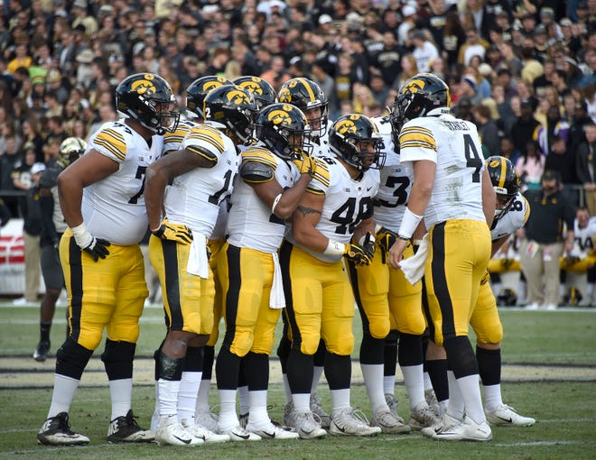 Nov 3, 2018; West Lafayette, IN, USA; Iowa Hawkeyes quarterback Nate Stanley (4) sets up a play in the huddle at Ross-Ade Stadium.
