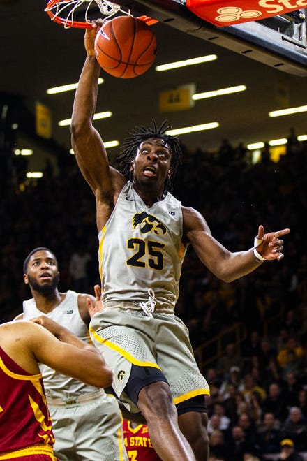 Iowa forward Tyler Cook (25) dunks during a NCAA Cy-Hawk series men's basketball game on Thursday, Dec. 6, 2018, at Carver-Hawkeye Arena in Iowa City.