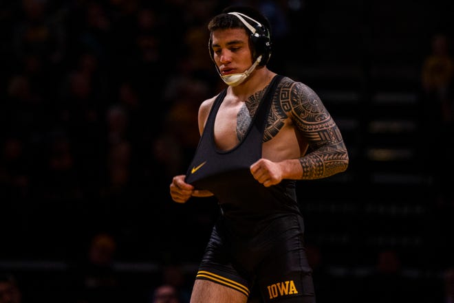 Iowa's Pat Lugo is introduced during a NCAA wrestling dual on Saturday, Dec. 8, 2018, at Carver-Hawkeye Arena in Iowa City.