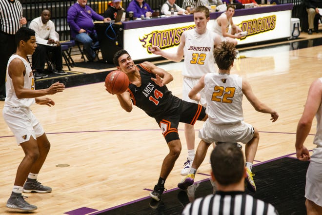 Ames freshman Tamin Lipsey is fouled while shooting during Ames' basketball game against Johnston on Friday, Jan. 11, 2019, in Johnston.