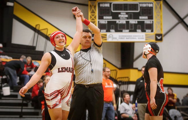LeMars junior Jacenta Sargisson celebrates after a win over Waukon's Nevaeh Bushaw at 170 pounds on Saturday, Jan. 19, 2019, during the first Iowa girls state wrestling tournament at Waverly-Shell Rock High School in Waverly.