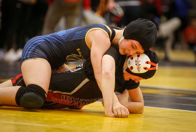 Davenport North junior Tateum Park controls Waukon's Meridian Snitker for a 113-pound state championship win on Saturday, Jan. 19, 2019, during the first Iowa girls state wrestling tournament at Waverly-Shell Rock High School in Waverly.